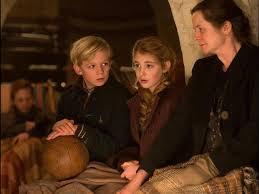 This image represents Liesel Meminger(the main character), her mother Rosa and her best friend Rudy