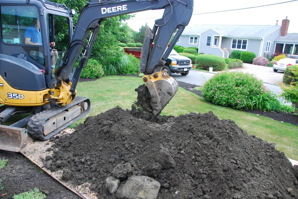 Excavating contractor drops removed dirt