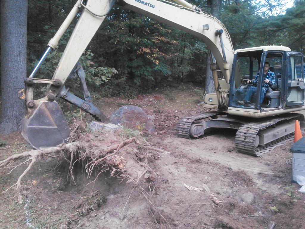 Phil's Excavating extracts large stump